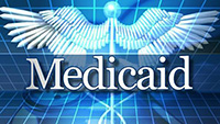 The image displays a logo with the word MEDICAID prominently featured against a background that includes a stylized eagle s head, medical-related symbols, and a digital interface with the word Medicare in a smaller font.